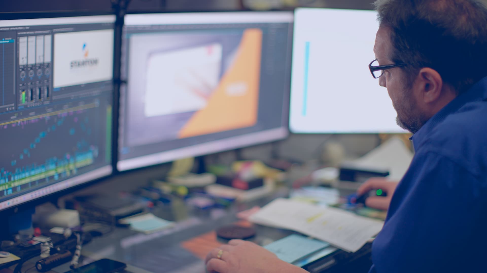 Stanton Creative Media team member editing a video on a computer.