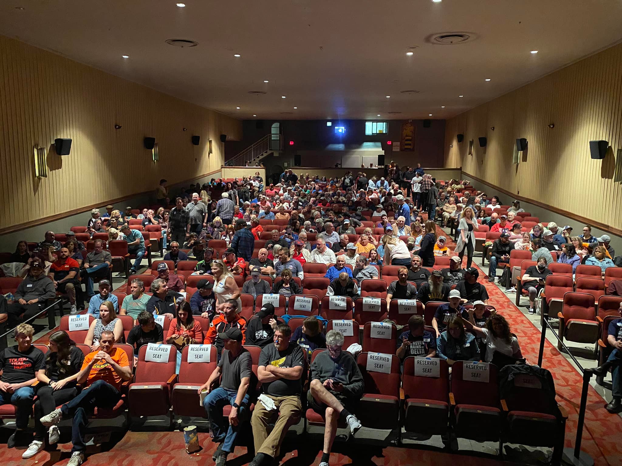 View of the seated audience inside of the Maumee Indoor Theater.